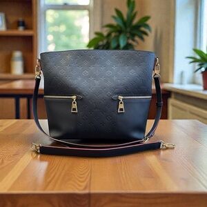 Louis Vuitton Mélie Hobo Bag in Marine-Rouge Monogram Empreinte Leather